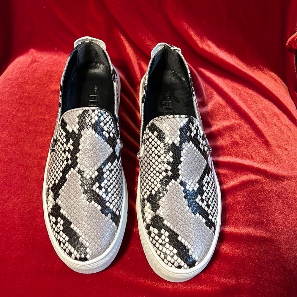 The Flexx Italian leather slip on sneaker in python.